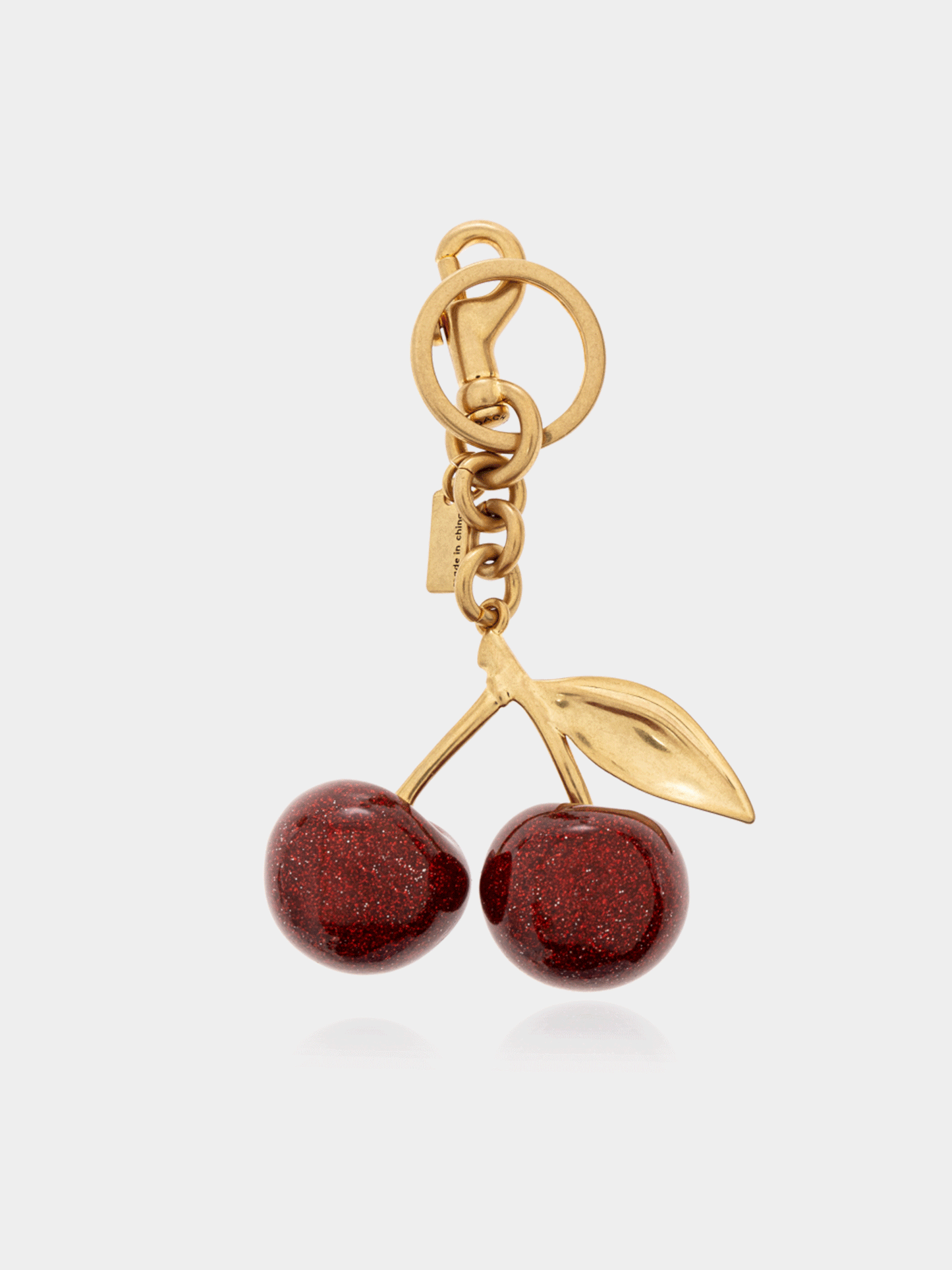 Coach Red Keychain With Cherry-Shaped Charm